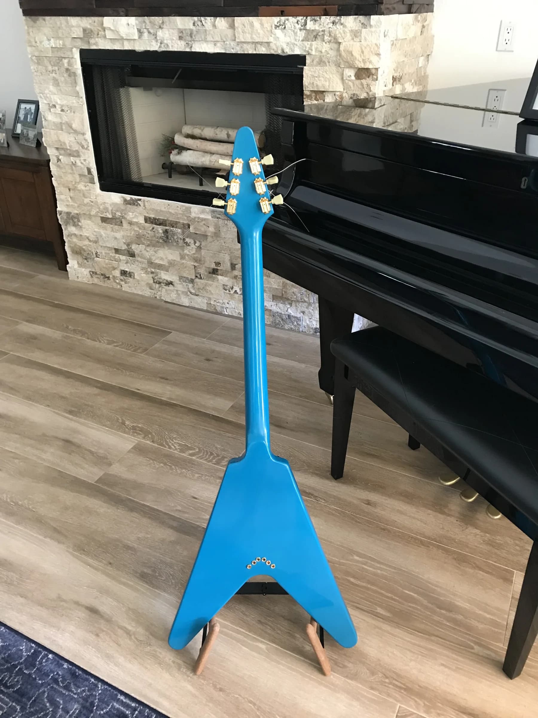 Rear view of a blue SJR-SRV guitar